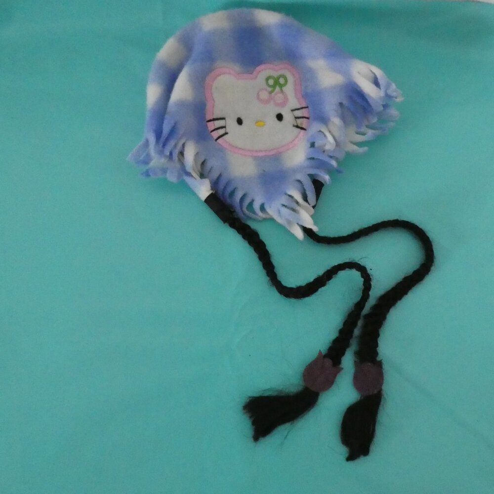 RARE HELLO KITTY Plastic Headband With Check Fleece And Black Braided Tassels